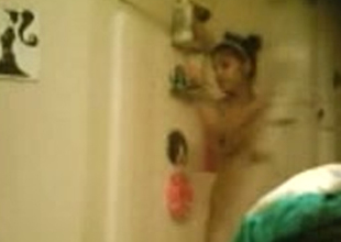 Hidden camera films amateur Indian girl in shower